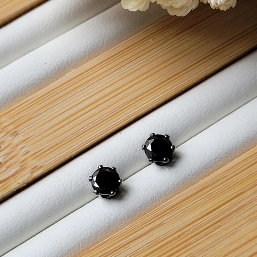 Brinco Ponto de Luz Negra